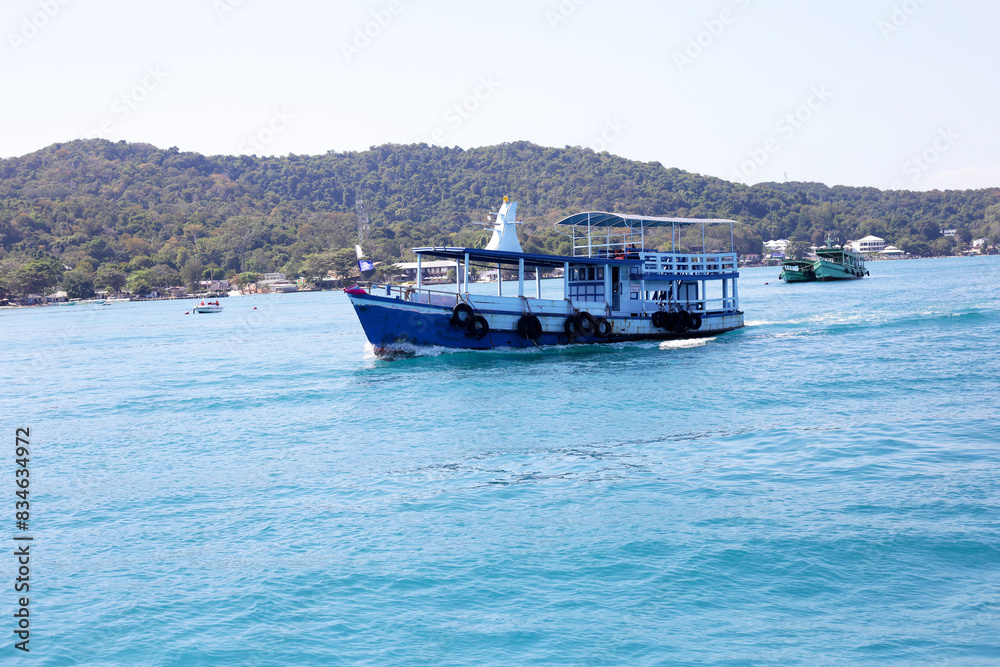 Ferry boat on the sea. Koh Salet, Thailand Ferry boat on the sea. Koh Salet, Thailand
