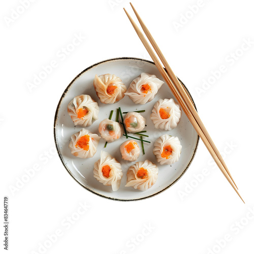 Shrimp dumplings on a white ceramic plate with chopsticks, top view, isolated on white background.

 photo