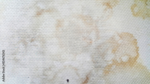 close-up yellow stains on mattresses, dirty mattress dust mites bed bugs