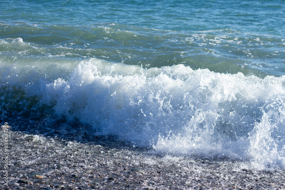 Fototapeta premium Sea wave crashing on the shore