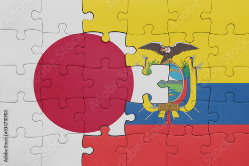 puzzle with the colourful national flag of ecuador and flag of japan.