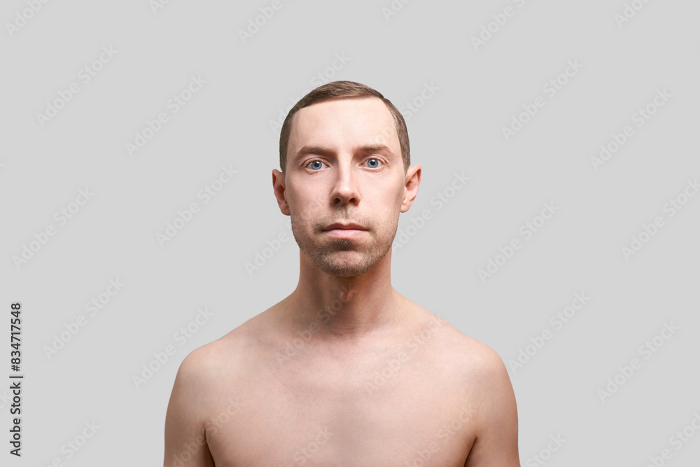 Serious caucasian man. Beauty cosmetology portrait. Calm health relax concept. Opened eyes. Male person. Dream about travel. Clean skin procedure. Handsome adult. Grey background. Serious caucasian man. Beauty cosmetology portrait. Calm health relax concept. Opened eyes. Male person. Dream about travel. Clean skin procedure. Handsome adult. Grey background.