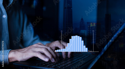 Businessman work with laptop and analyzing distribution data with histogram graph statistical process control and development process at workplace, quality control improvement concept