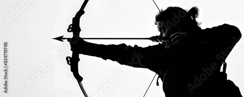 A stark silhouette of an archer drawing a bow with an arrow against a white background, depicting focus. photo