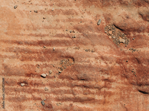 Red stone texture with sand