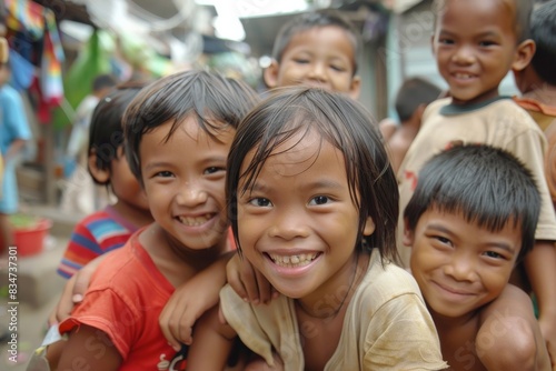 Group of happy asian children smiling and looking at the camera.