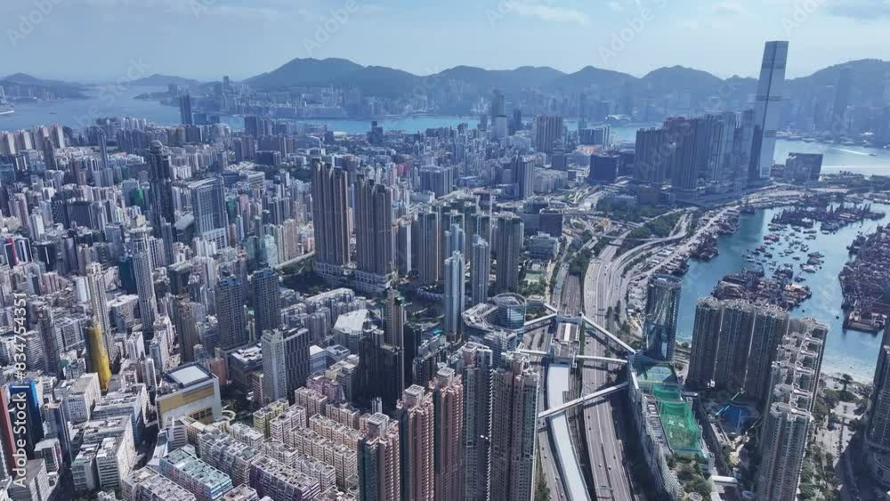 Soar over the bustling streets of Sham Shui Po, witnessing urban renewal projects transforming Hong Kong's densely populated residential and commercial districts Soar over the bustling streets of Sham Shui Po, witnessing urban renewal projects transforming Hong Kong's densely populated residential and commercial districts