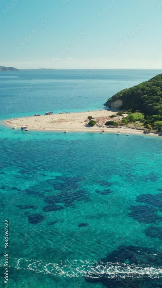 Aerial view o a beautiful wild beach on Marathonisi Island near Zakynthos island in Greece. Marathon island at sunrise in Zante, Ionian sea. Paradise island with turquoise sea water. Aerial view o a beautiful wild beach on Marathonisi Island near Zakynthos island in Greece. Marathon island at sunrise in Zante, Ionian sea. Paradise island with turquoise sea water.