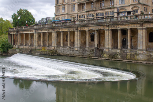 The Pulteney Weir on the River Avon overlooked by The Colonaddes in the beautiful City of Bath in Somersel England