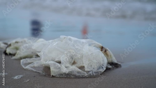 Close-up, a plastic garbage on the beach