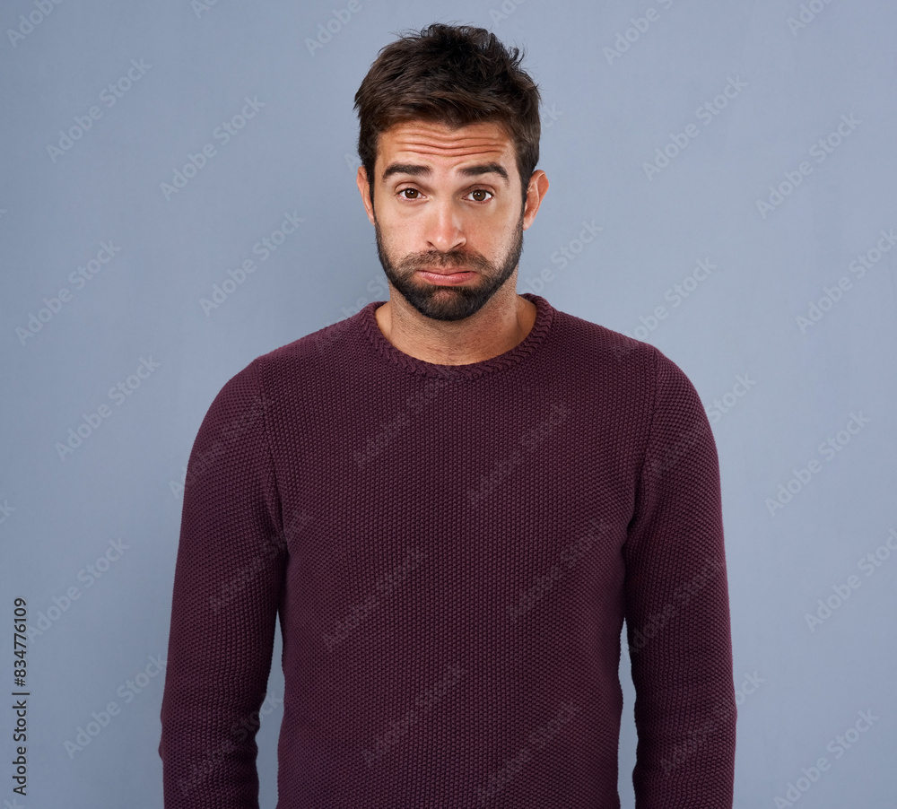 Studio, portrait and anxiety of man, frustrated and burnout with depression and confused with exhaustion. Blue background, face and person with headache, sad and tired with mental health in New York Studio, portrait and anxiety of man, frustrated and burnout with depression and confused with exhaustion. Blue background, face and person with headache, sad and tired with mental health in New York