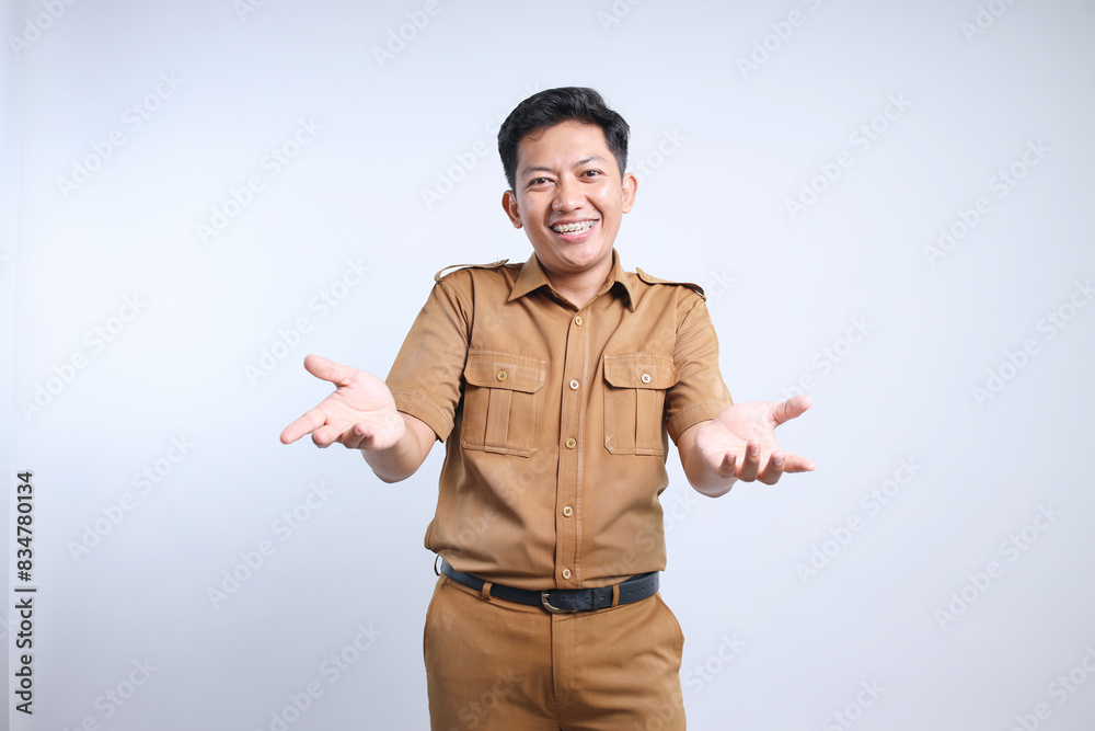 Asian Man Civil Servants Wear Brown Uniform Open Both Hands Showing Welcome Gesture Asian Man Civil Servants Wear Brown Uniform Open Both Hands Showing Welcome Gesture