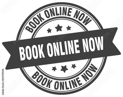 book online now stamp. book online now label on transparent background. round sign
