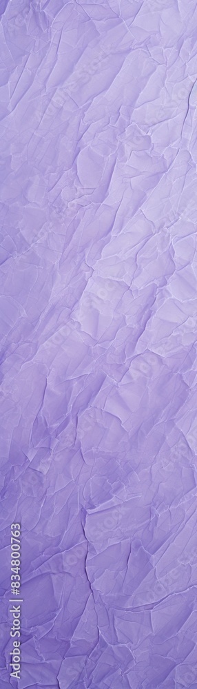 Obraz premium A crumpled piece of purple cloth with a rough texture.
