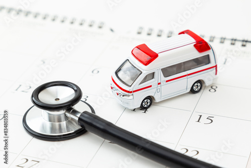 カレンダーと聴診器と救急車 photo