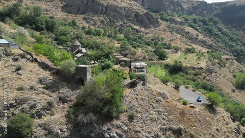 Aerial arcs toward ancient Armenian Gndevank Monastery in Gndevaz photo