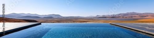 Desert Oasis Pool with Scenic Mountain View © patpongstock