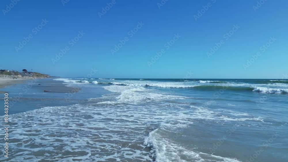 Drone flight over ocean waves on a beautiful sunny day in Carlsbad California. Drone flight over ocean waves on a beautiful sunny day in Carlsbad California.