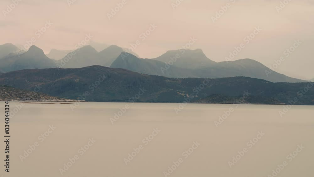 Mountainous fjord cost wrapped in thick fog. Parallax dolly shot Mountainous fjord cost wrapped in thick fog. Parallax dolly shot