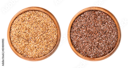 Golden and brown flax seeds in wooden bowls. Whole common flax or linseed, Linum usitatissimum, rich in omega-3 fatty acids, used as a nutritional supplement, or for linseed oil. Isolated, food photo.