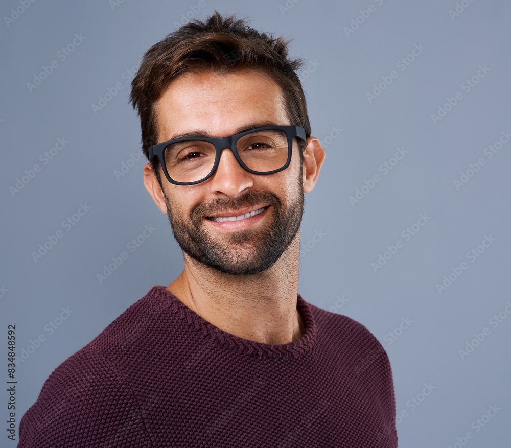 Studio, glasses and man with wellness, portrait and smile for eye care, product and lens for vision. Blue background, face and happiness for person, prescription and eyewear with fashion in USA Studio, glasses and man with wellness, portrait and smile for eye care, product and lens for vision. Blue background, face and happiness for person, prescription and eyewear with fashion in USA