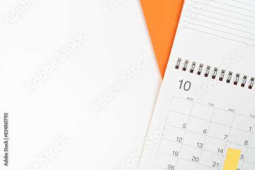close up of calendar on the white table background, planning for business meeting or travel planning concept
