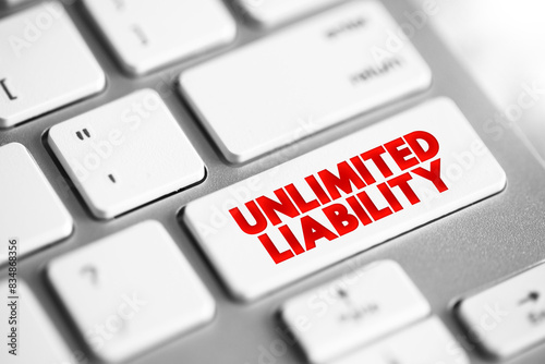 Unlimited Liability is when one or more individuals are liable for their company's taxation and debts, text concept button on keyboard photo