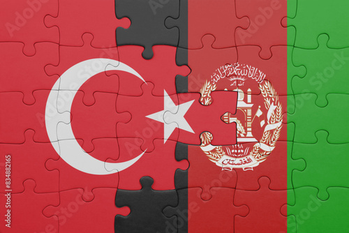 Fototapeta Naklejka Na Ścianę i Meble -  puzzle with the colourful national flag of afghanistan and flag of turkey.