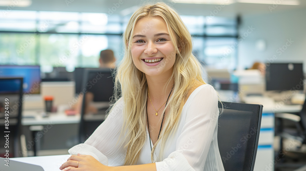 A smiling woman seated at an office, casual style, on an office background, concept of a workplace environment. Generative AI A smiling woman seated at an office, casual style, on an office background, concept of a workplace environment. Generative AI