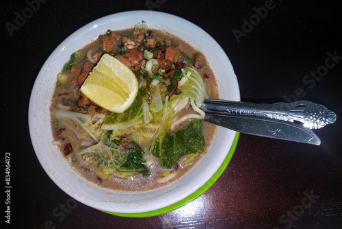 Indonesian food. Pangsip noodles are similar to Chicken Noodles with the addition of vegetables photo