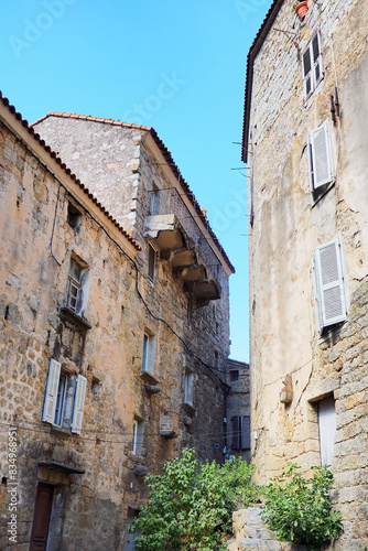 One of the charms of Sartène, a town in Corsica (Island of Beauty), in the heart of the Mediterranean Sea, is its narrow streets: stone houses with laundry drying in the windows and cobbled staircases