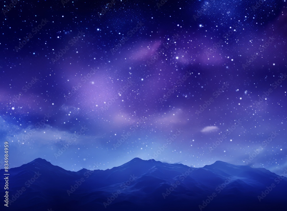 Obraz premium A majestic mountain range under a starry night sky.