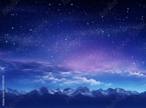 A majestic mountain range under a starry night sky.