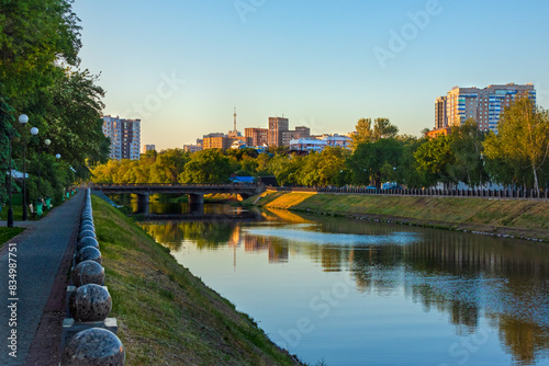 Fényképezés Cityscape with the Lopan River and embankment on a summer evening