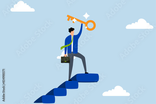 Key to business success,winning businessman walks to top of stairs, raising golden success key to sky.