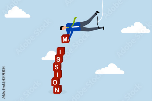 Business mission, businessman hanging from above manages to complete task blocks.