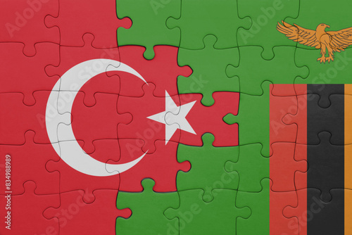 puzzle with the colourful national flag of zambia and flag of turkey.