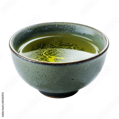 Extreme front view of energizing green tea in a traditional Japanese teacup isolated on a white transparent background