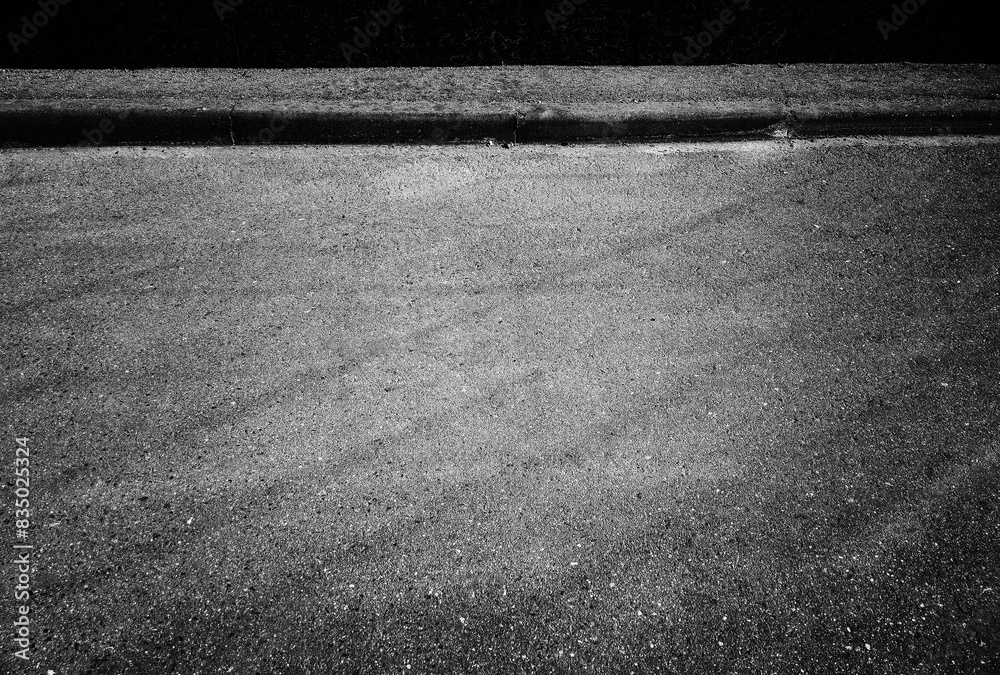 Fototapeta premium Glass reflections on asphalt road background