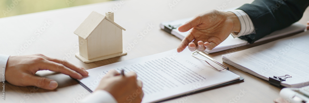 Approved stamp with Business people signing contract making deal with real estate consultant home insurance.Real estate investment Property insurance security offer house.