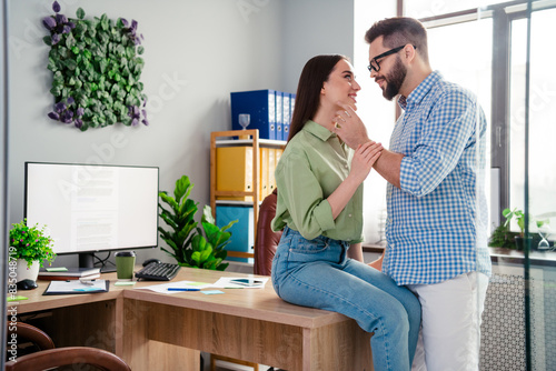 Photo of two business people in workstation office have love affair man touch chin seduce girl