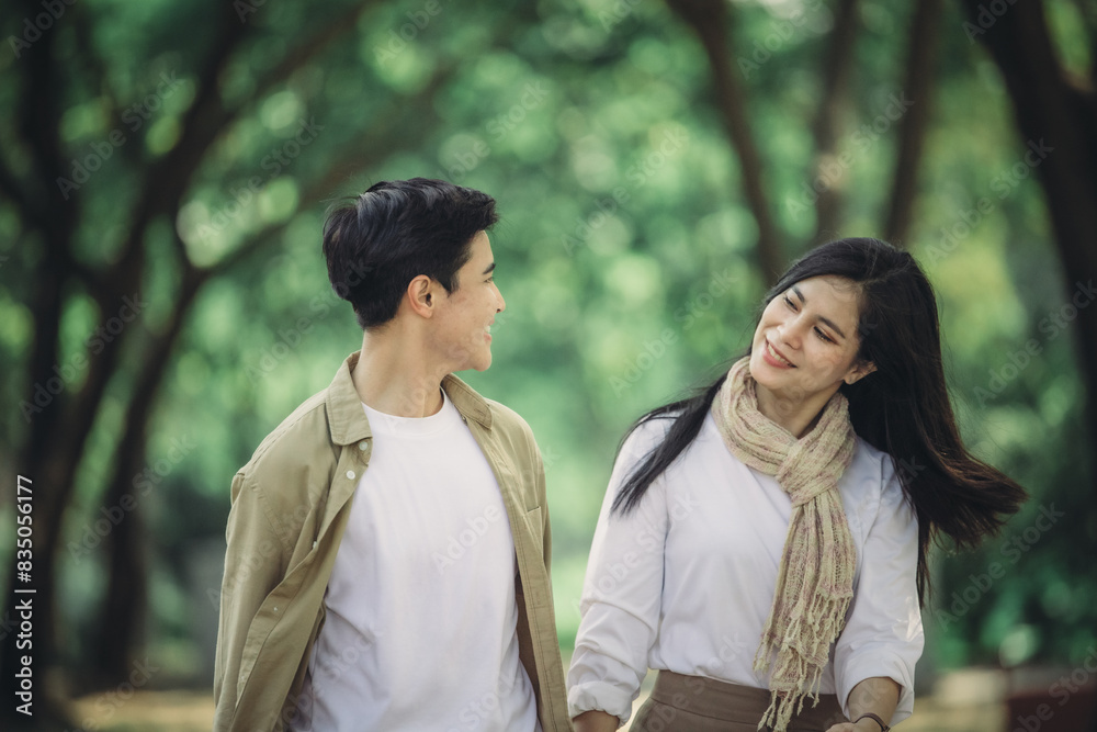 Lesbian couple sharing romantic love and care in public, celebrating joyful union as life partners. Lesbian couple sharing romantic love and care in public, celebrating joyful union as life partners.