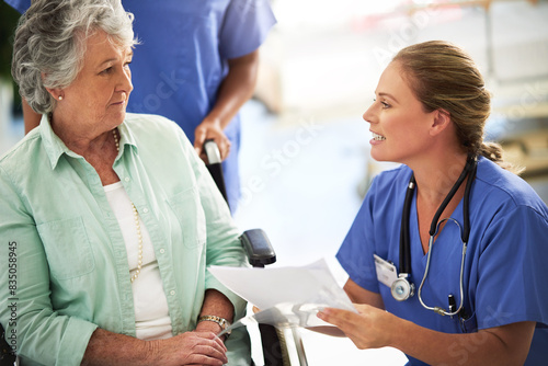 Senior woman  document and discussion with doctor in hospital  medical results or treatment for health insurance. Medic  patient and wheelchair for paperwork  history or evaluation of information