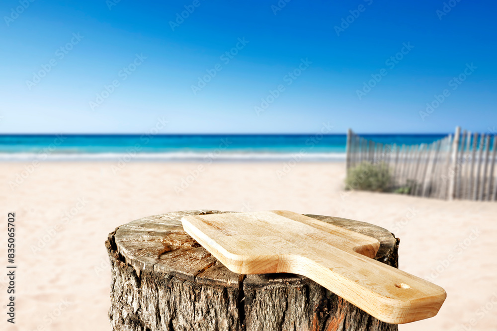 Fototapeta premium Wooden pedestal of empty space for your decoration and hot summer day. Landscape of sea and beach 