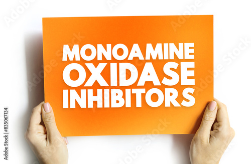 Monoamine Oxidase Inhibitors - class of drugs that inhibit the activity of one or both monoamine oxidase enzymes, text concept on card photo
