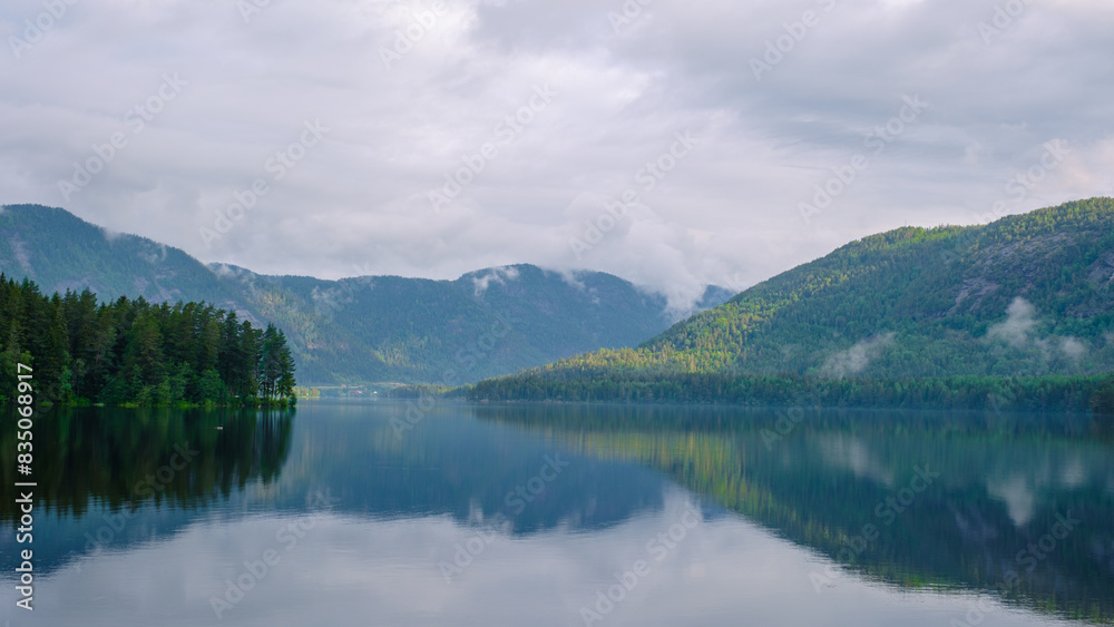 Araksfjorden Lake in Norway is, a beautiful mountain lake at sunrise