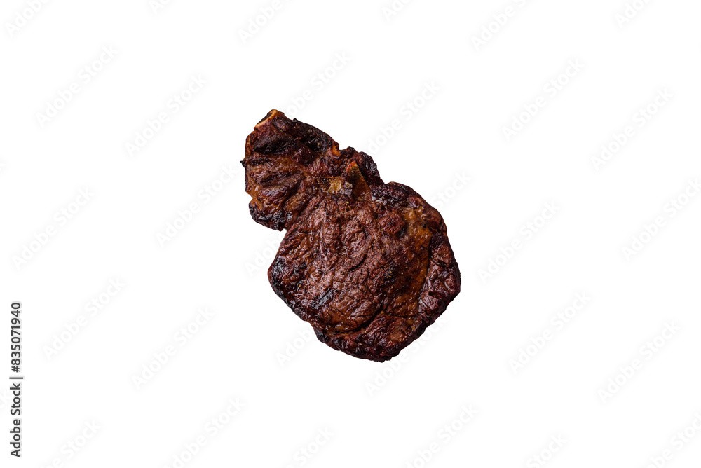 Delicious juicy beef ribeye steak grilled with salt, spices and herbs Delicious juicy beef ribeye steak grilled with salt, spices and herbs
