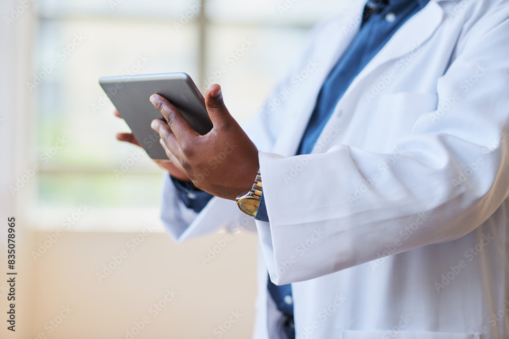Healthcare Professional Using Tablet in Modern Hospital Setting for Patient Management Healthcare Professional Using Tablet in Modern Hospital Setting for Patient Management