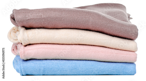 Stack folded sweaters on white background isolation