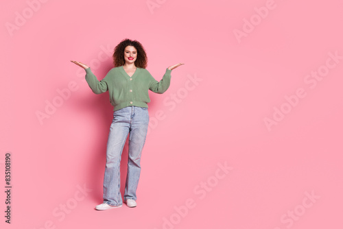 Photo of gorgeous charming woman wear stylish clothes demonstrate empty space news isolated on pink color background